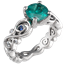 Contemporary Infinity Engagement Ring with Emerald, Blue Sapphires and Diamonds
