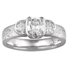 Cushion Cut Diamond in Three Stone Engagement Ring with White Mokume - top view