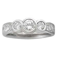 Three Stone Ring with Half Carat Diamond and Two Quarter Carat Diamonds - top view
