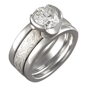 Modern Scaffolding Engagement Ring with Round Diamond and Two Cutout Head with White Mokume Band