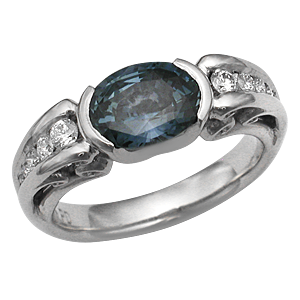 Carved Curls Engagement Ring with Tapering Diamonds and Blue Sapphire