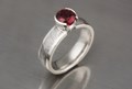 Gibeon Meteorite Solitaire Engagement Ring with Round Garnet
