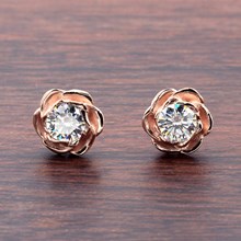 Large Rose Gold Rose Stud Earrings With Moissanites - top view