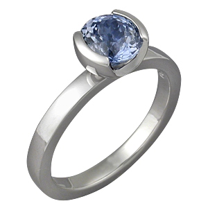 Modern Solitaire Engagement Ring with Blue Sapphire