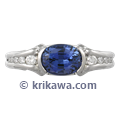 Carved Curls Engagement Ring with Oval Blue Sapphire