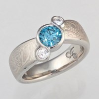 infinity three stone mokume engagement ring