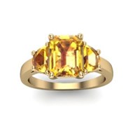 yellow sapphire and yellow gold three stone engagement ring
