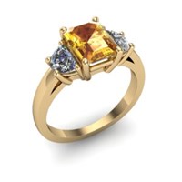 Sapphire and diamond three stone engagement ring