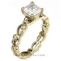 yellow gold delicate leaf engagement ring with princess cut diamond