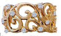 Wide swirly gold ring with diamonds
