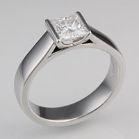 Modern cathedral engagement ring