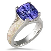 mokume wing engagement ring with sapphire