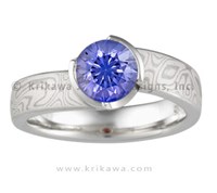 unique engagement ring with round blue sapphire
