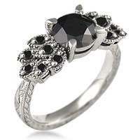 antique leaf engagement ring with black diamonds