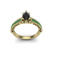 Black diamond and emerald yellow gold engagement ring vintage