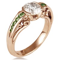 carved curls engagement ring in rose gold and green diamonds