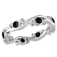 carved curls wedding band with black diamonds