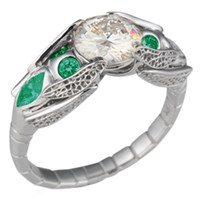 dragonfly engagement ring with emeralds and diamond