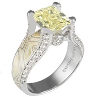 juicy light engagement ring with yellow diamond