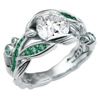 garden trellis engagement ring with emerald accents
