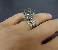 Big engagement ring with yellow band