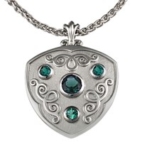 family shield pendant with emeralds