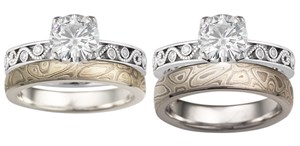 millegrained curls engagement ring and mokume wedding band