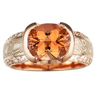 mokume diamond silhouette engagement ring with orange stone