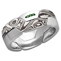 mokume puzzle wedding band with green diamond accents