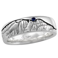 mountain wedding band with flush sapphire