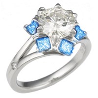 snowflake engagement ring with light blue sapphires