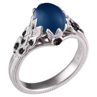 vintage wreath engagement ring with blue cabochon