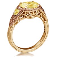 Vintage engagement ring with yellow gold yellow diamonds and champagne diamonds