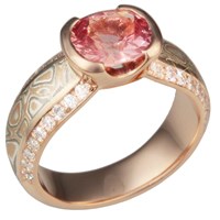 oval salmon spinel engagement ring