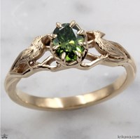 custom engagement ring with birds