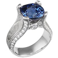 mokume juicy engagement ring with blue sapphire