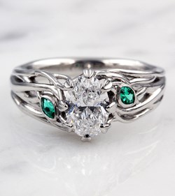 Embracing Tree Branch Engagement Ring with Emerald Accents
