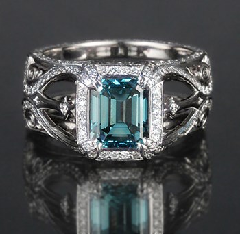 custom engagement ring with blue diamond