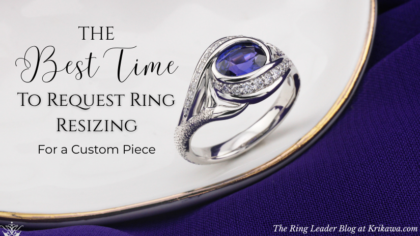 Close up image of a custom engagement ring in platinum with a purple gemstone, on a white plate with a purple background.