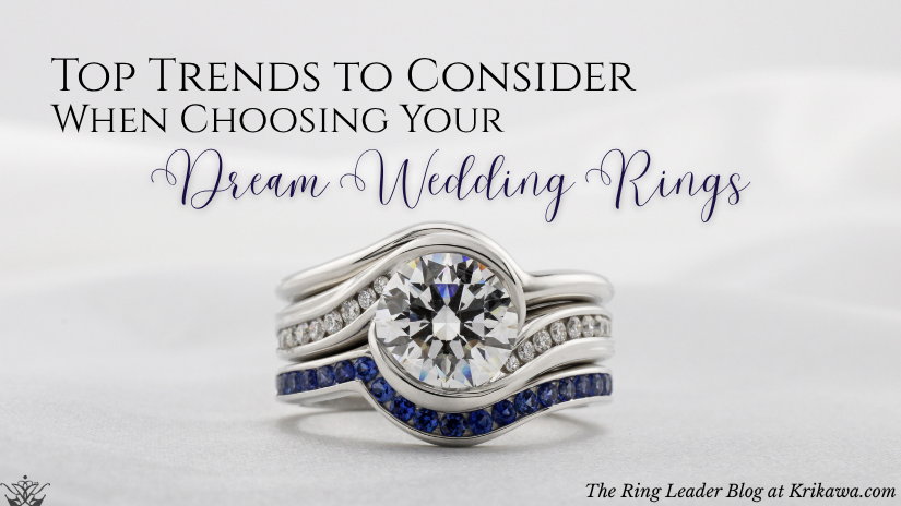 Beautiful bridal set with a white diamond center stone, white diamond accent stones and a wedding band that fits perfectly with blue sapphire accent stones.
