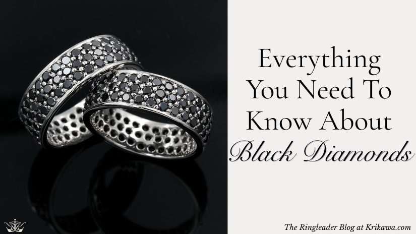 Two wedding bands with black diamonds