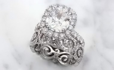 decadent infinity engagement ring with a pave bridal wedding ring