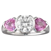  	Modern Three-Stone Engagement Ring with Round and Heart Shaped Stones - top view