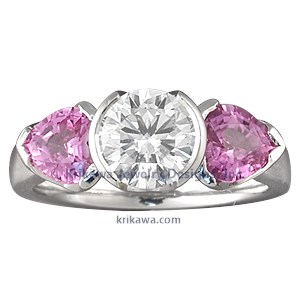  	Modern Three-Stone Engagement Ring with Round and Heart Shaped Stones