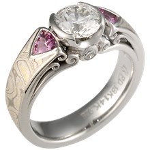 Mokume Carved Curls Three Stone Engagement Ring