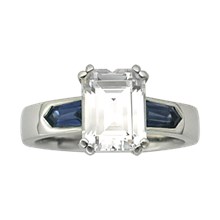 Modern Three Stone Engagement Ring with Emerald and Tapered Bullets - top view