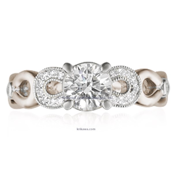 This engagement ring features infinity symbols around the band.  The infinity beneath the head has diamond pave and millegrain detail. 