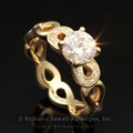 Pave Infinity Engagement Ring with Yellow Gold, Diamonds, and Infinity Symbols