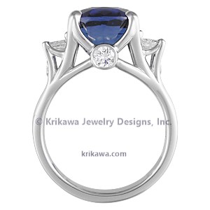 The branch-like prongs are handcrafted to support different stone shapes.