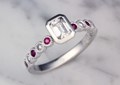 Vintage Lacy Engagement Ring with alternating ruby and diamond accents.
